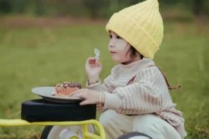 Image of a baby eating cake